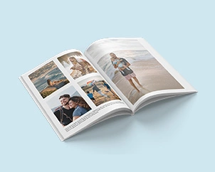 Aufgeschlagenes Softcover-Fotobuch mit Urlaubsbildern